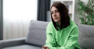 Someone thinking about telling her family she's pregnant
